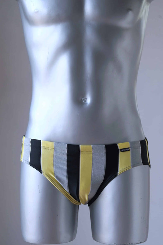 JACKY PEER Vintage black, grey and yellow Striped Swim Briefs worn by mannequin.