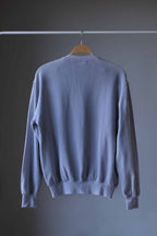 backside of close up of Gray Lacoste 90s sweatshirt on hanger