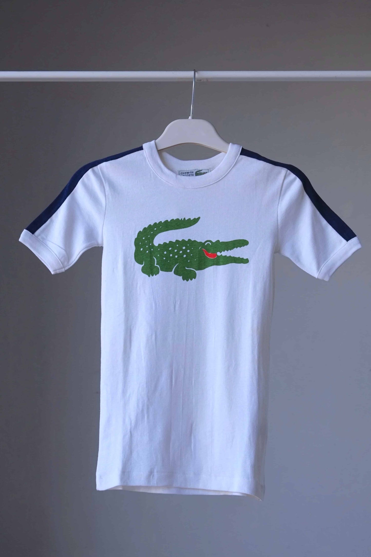 LACOSTE Crocodile Logo T-shirt in white on hanger