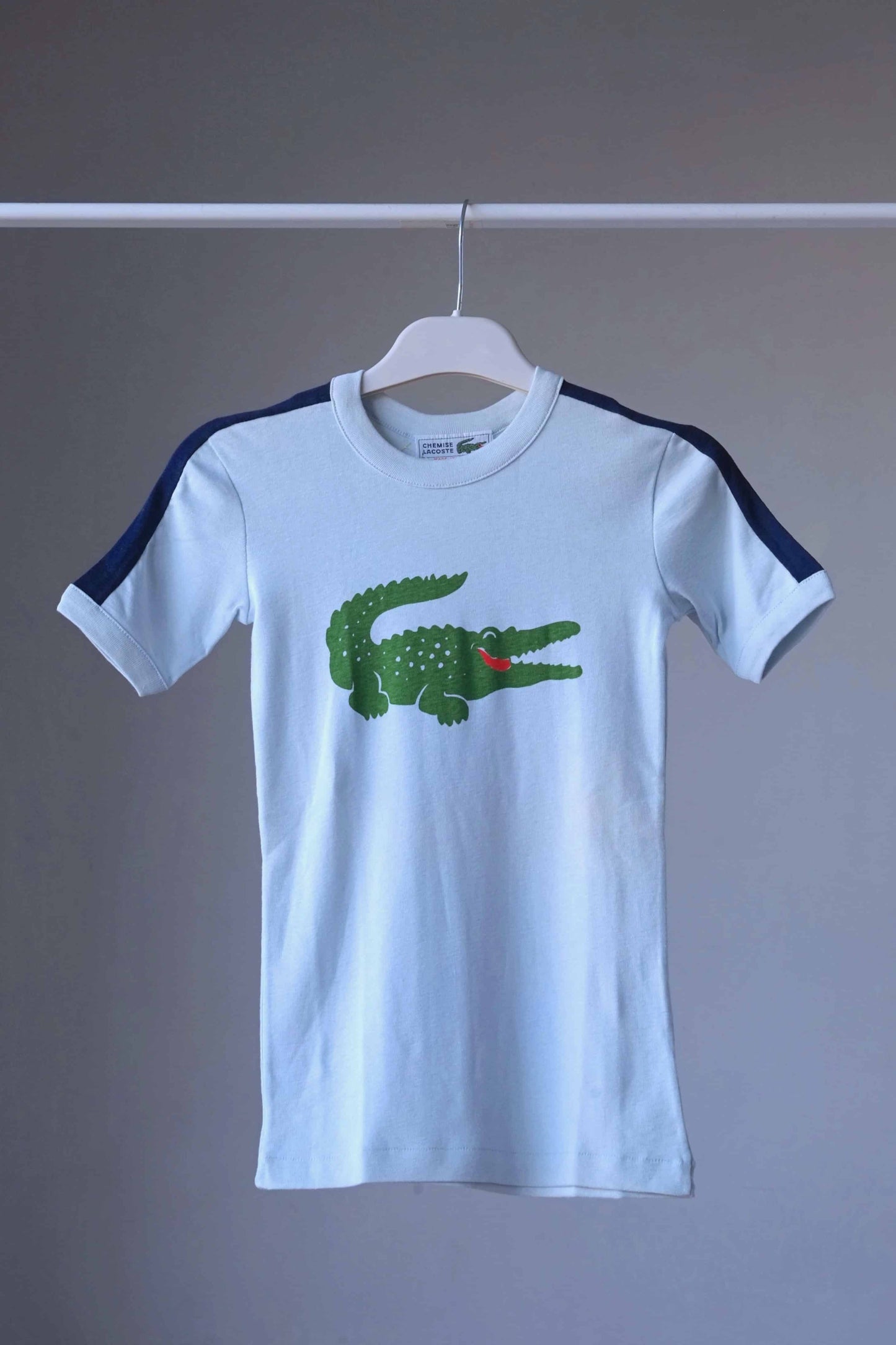 LACOSTE Crocodile Logo T-shirt in light blue on hanger