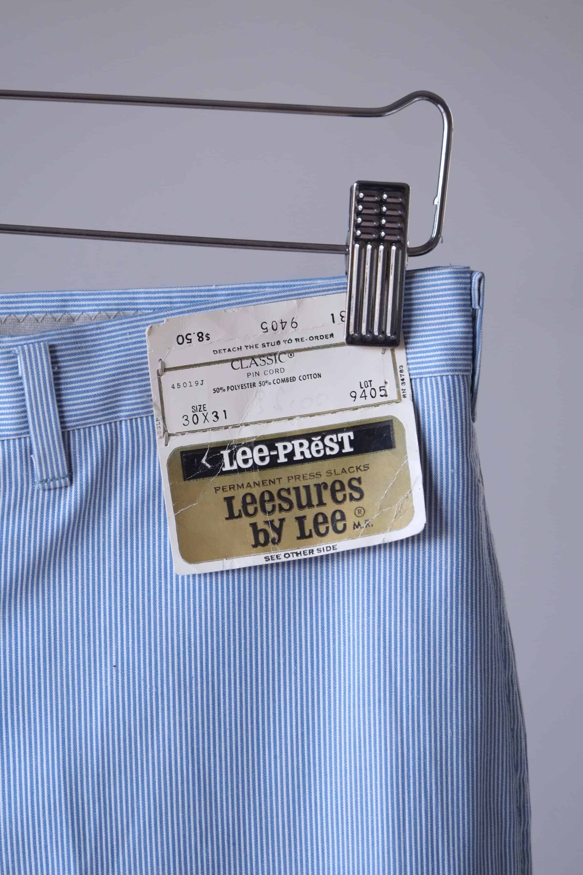 Close view of the label on the waist of a pair of LEE Prest Vintage 60's Classic Pinstripe Cord Slacks