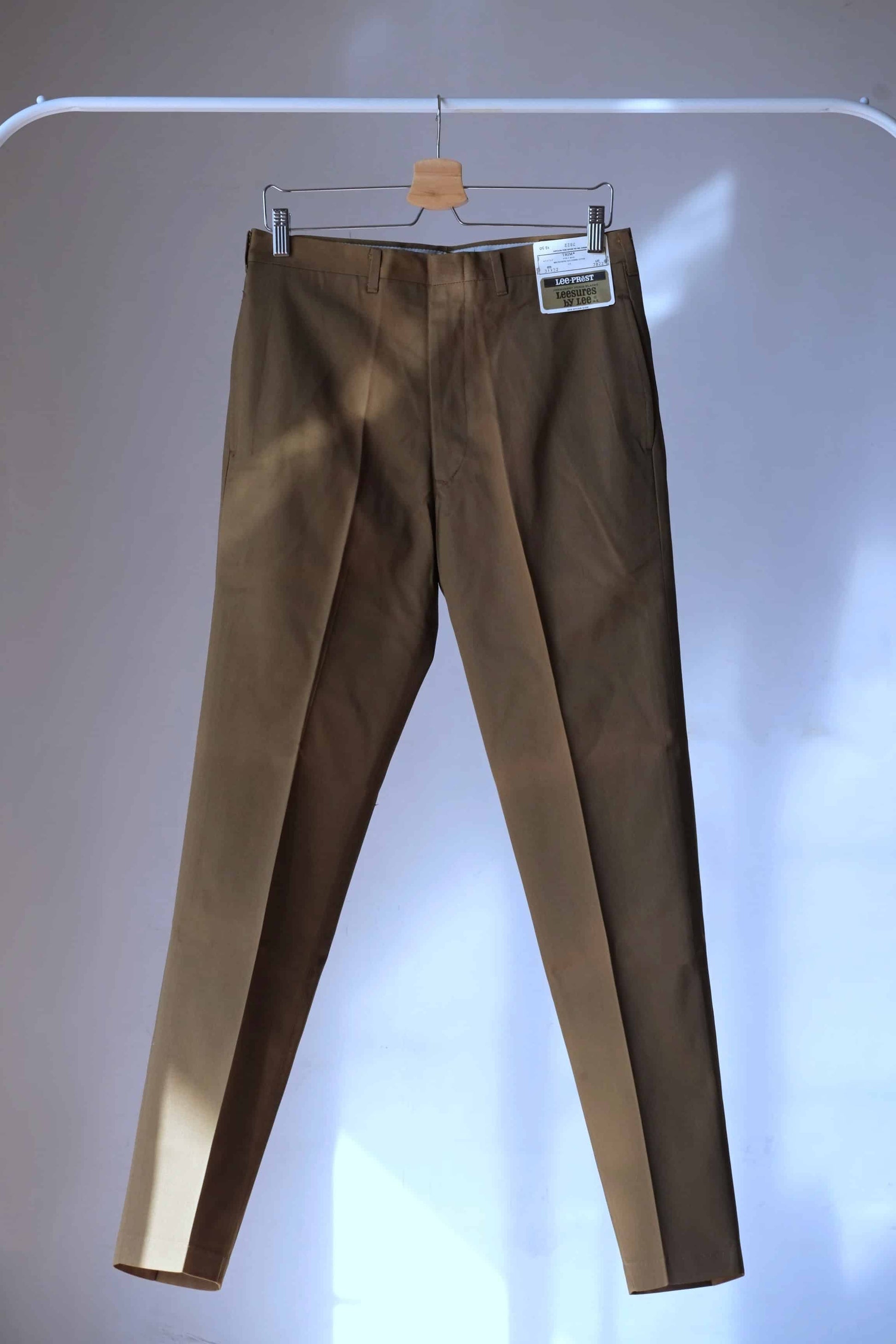 Vintage Lee Pants in brown on hanger