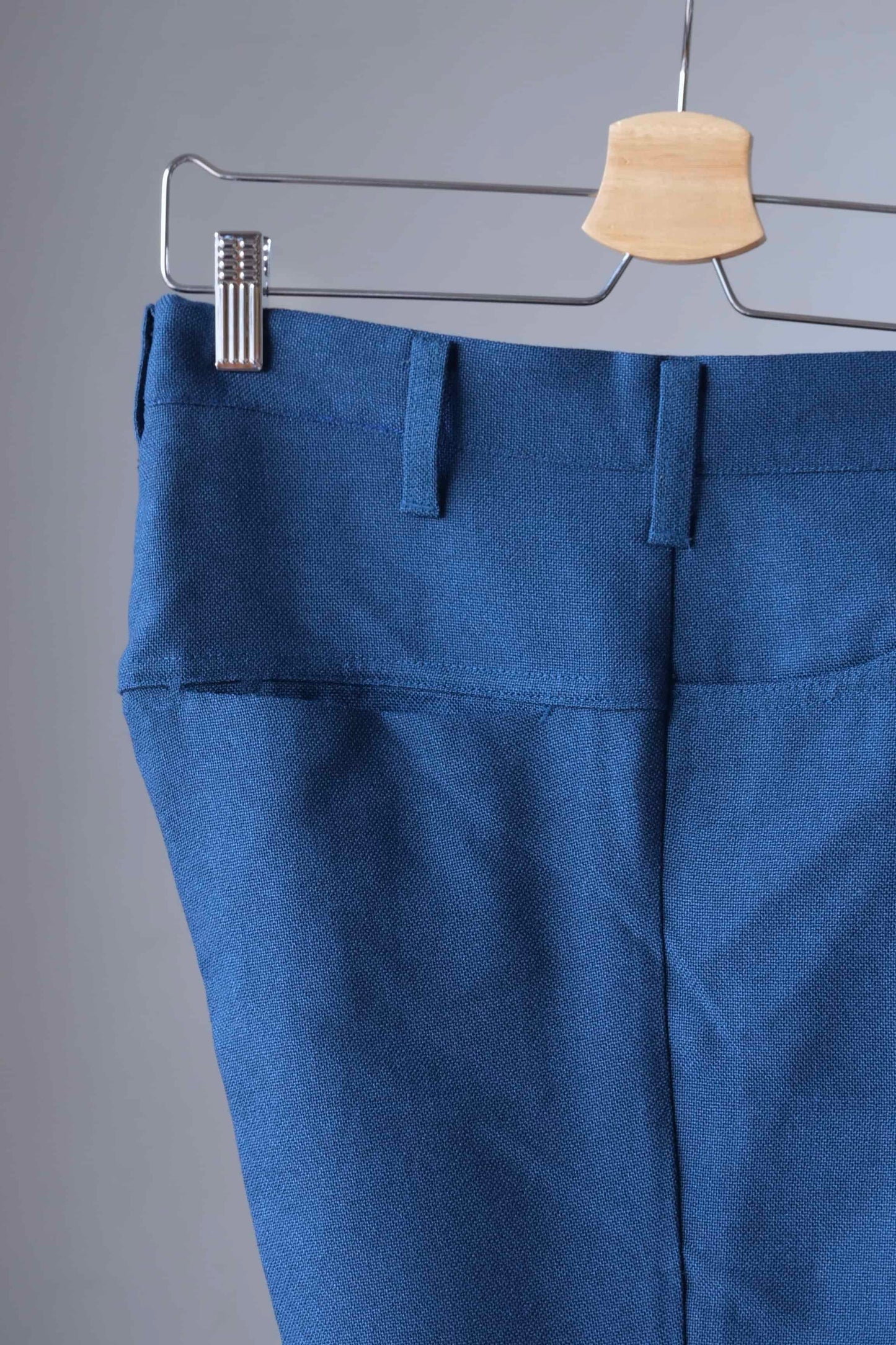 LEE 70's Vintage Slacks petrol blue on hanger close up