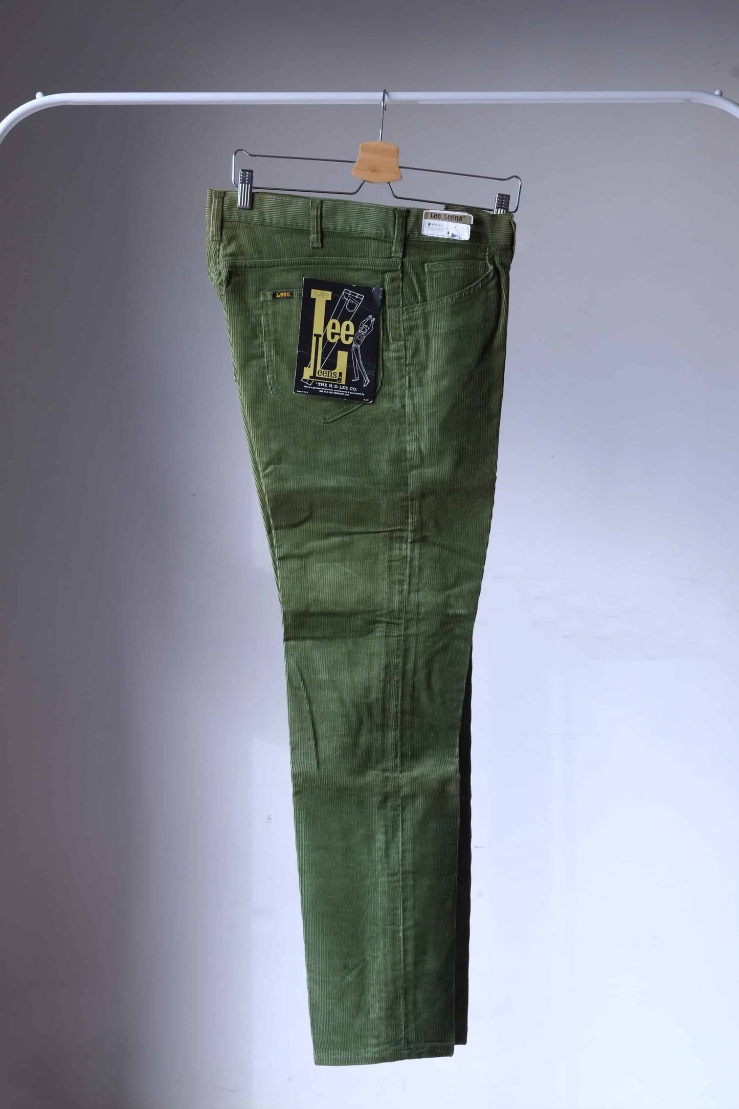LEE Corduoroy Pants in olive green on hanger