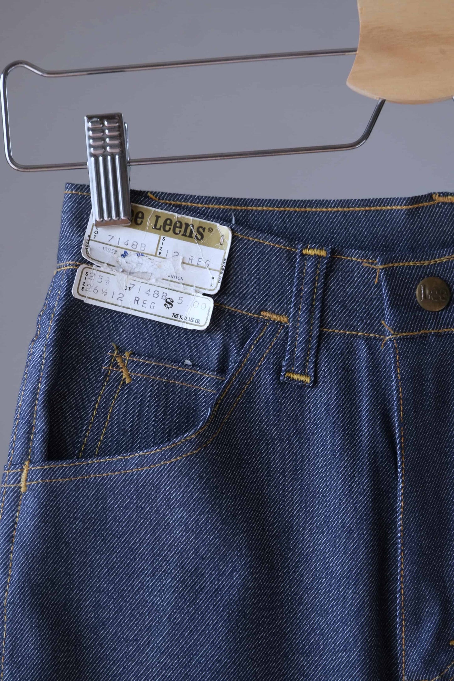 Close view of the tag on a pair of vintage Lee lastic stretch jeans