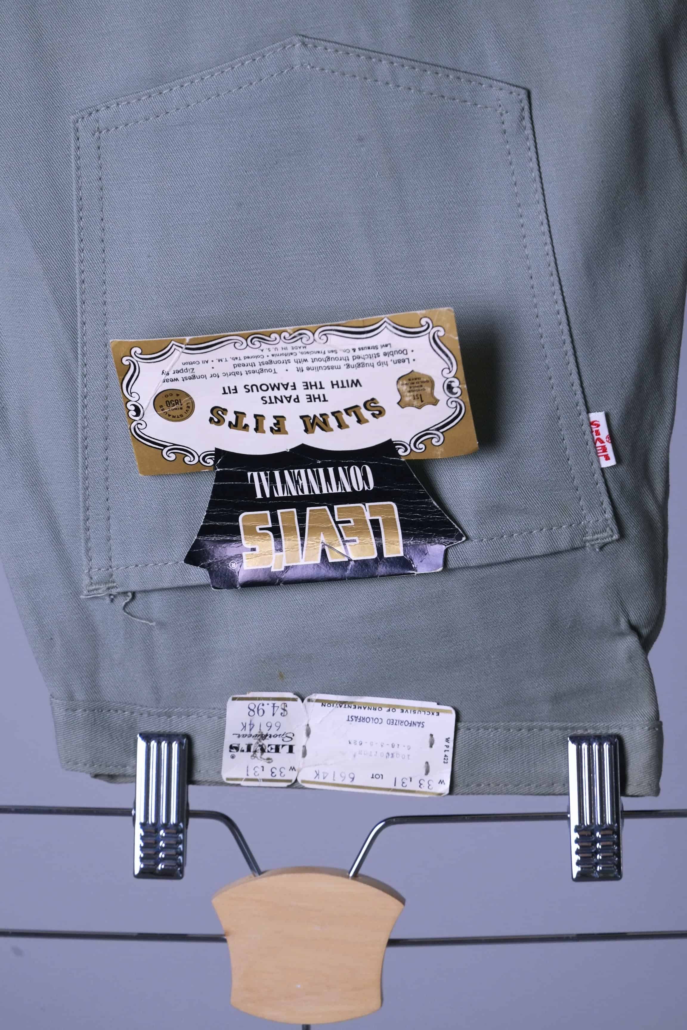 Close-up shot of the back pocket of the Deadstock Levi's Continental Slim Fit Chinos showing the original paper tag, Big E red tab, and lot number 6614K.