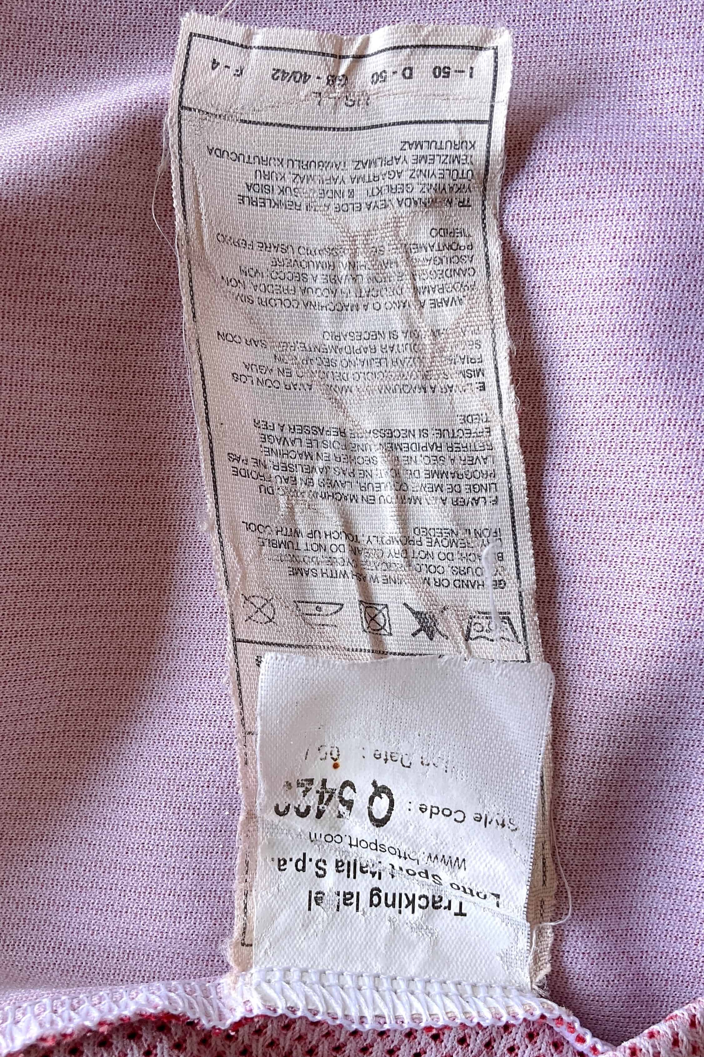 Close up of the inner wash label of Lotto Genoa CFC 2012-13 Home Jersey.