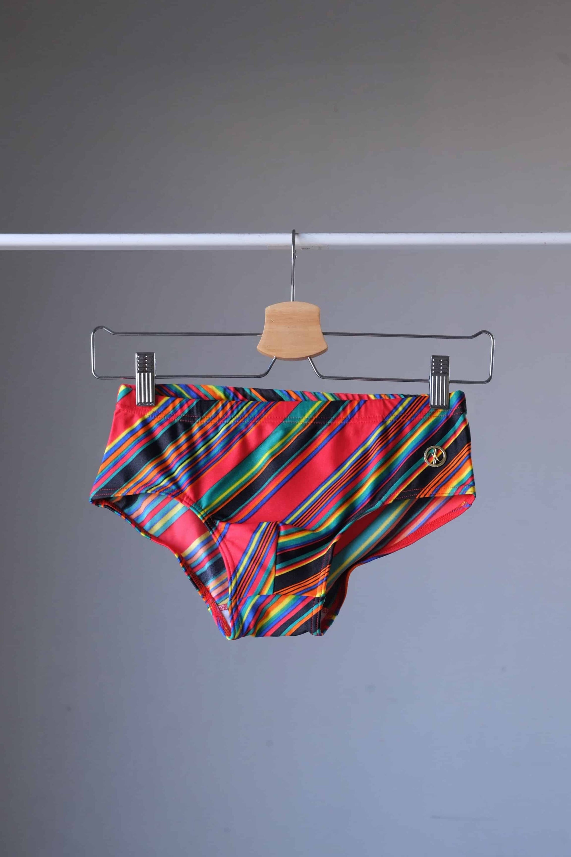 MONSIEUR ORCHIDÉE Vintage 80's Men's Swim Briefs: Retro Striped Swimwear, red color om hanger