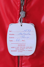 The original paper manufacturer's tag attached to the red Mossant jacket. The tag lists the model as "Natacha," the color as "Rouge" (Red), and the size as 46, with French care instructions printed below.
