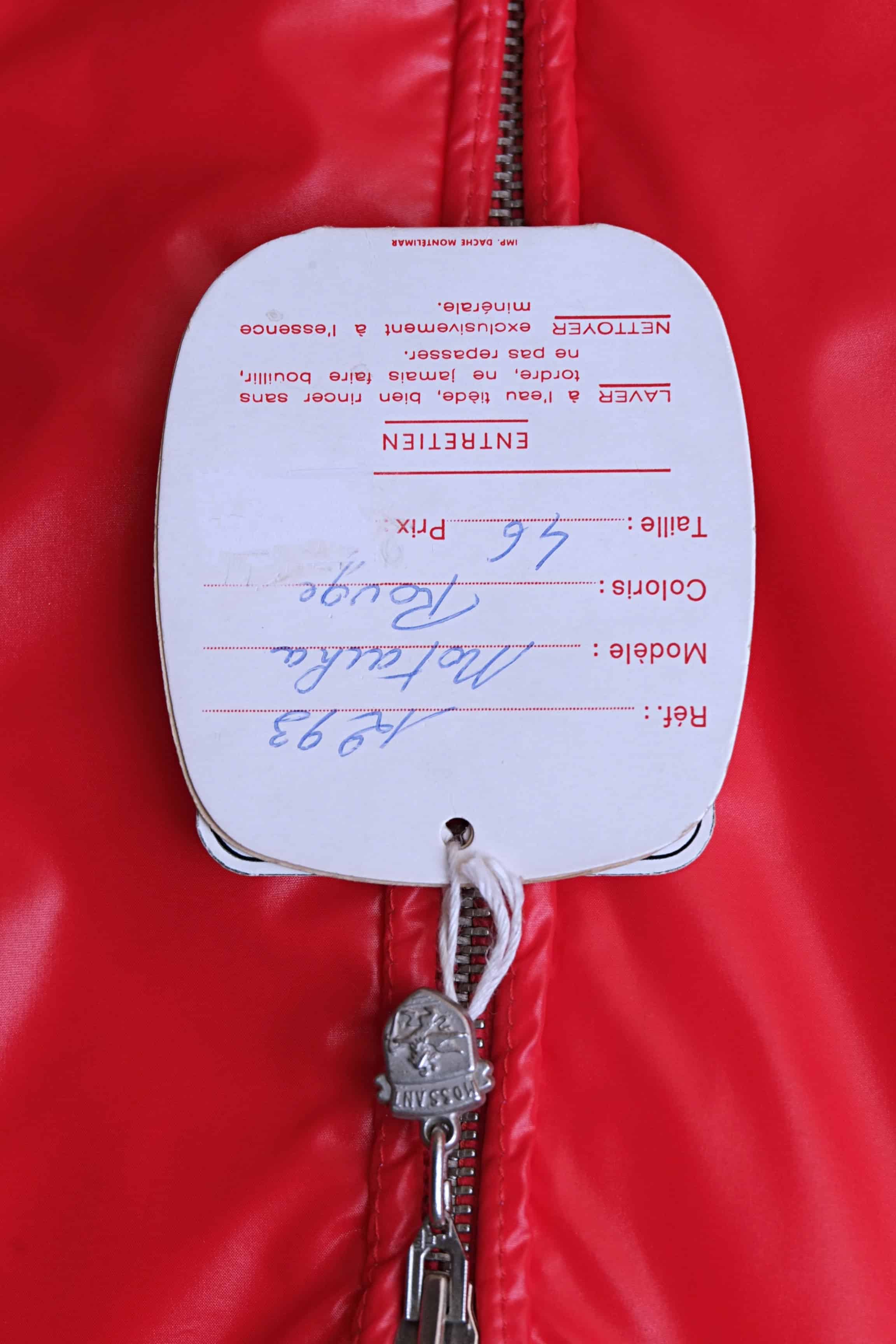 The original paper manufacturer's tag attached to the red Mossant jacket. The tag lists the model as "Natacha," the color as "Rouge" (Red), and the size as 46, with French care instructions printed below.