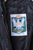 Close-up of the Imperial Mossant Paris woven inner label featuring a white eagle crest on a green background and size 40 tag.