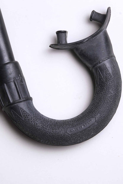 Close up of the mouthpiece of a Vintage Nemrod Menorca snorkel on white background