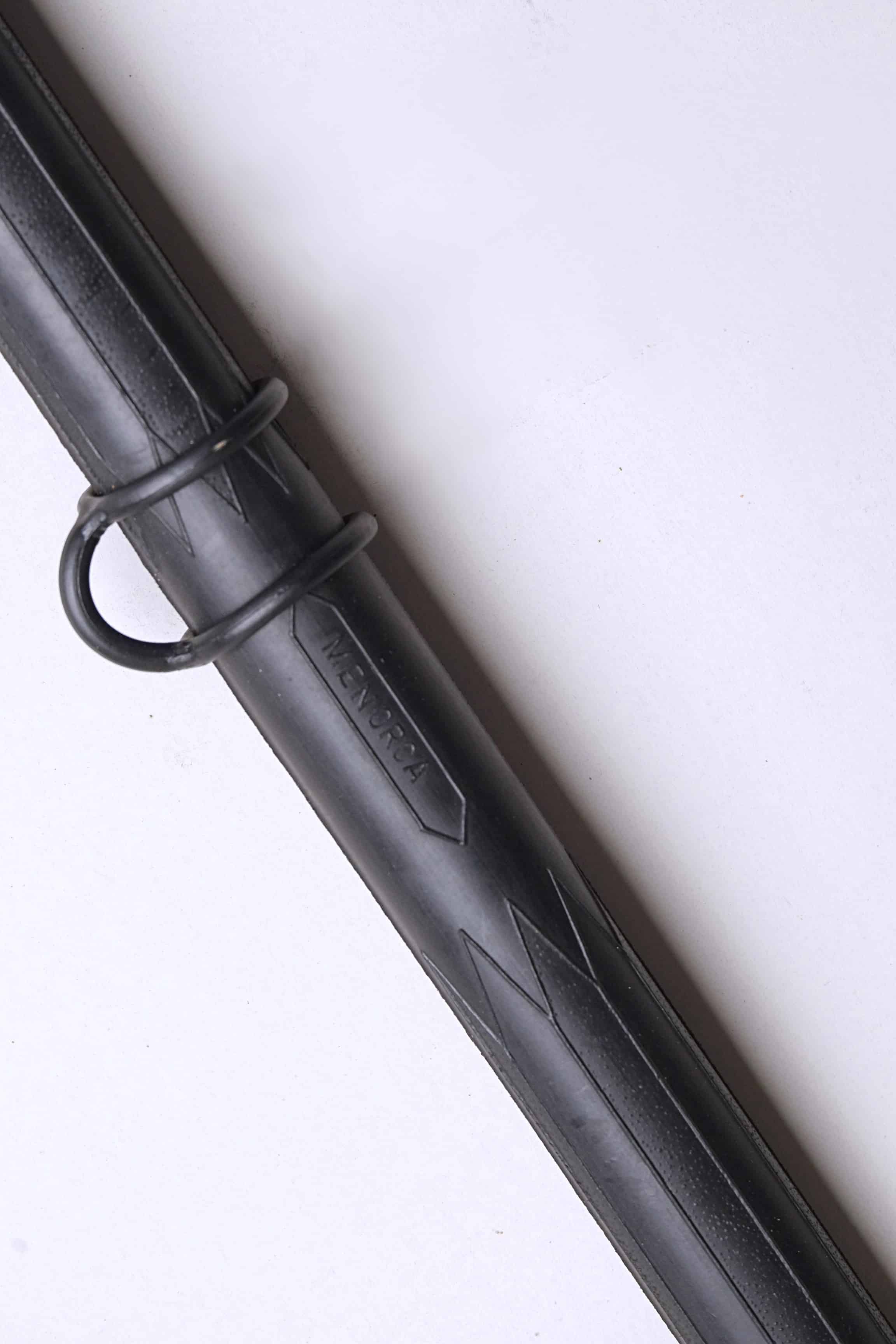 Close up of a Vintage Nemrod Menorca snorkel on white background, showing the word Menorca.