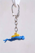 Nemrod diver keychain photographed on a white background.