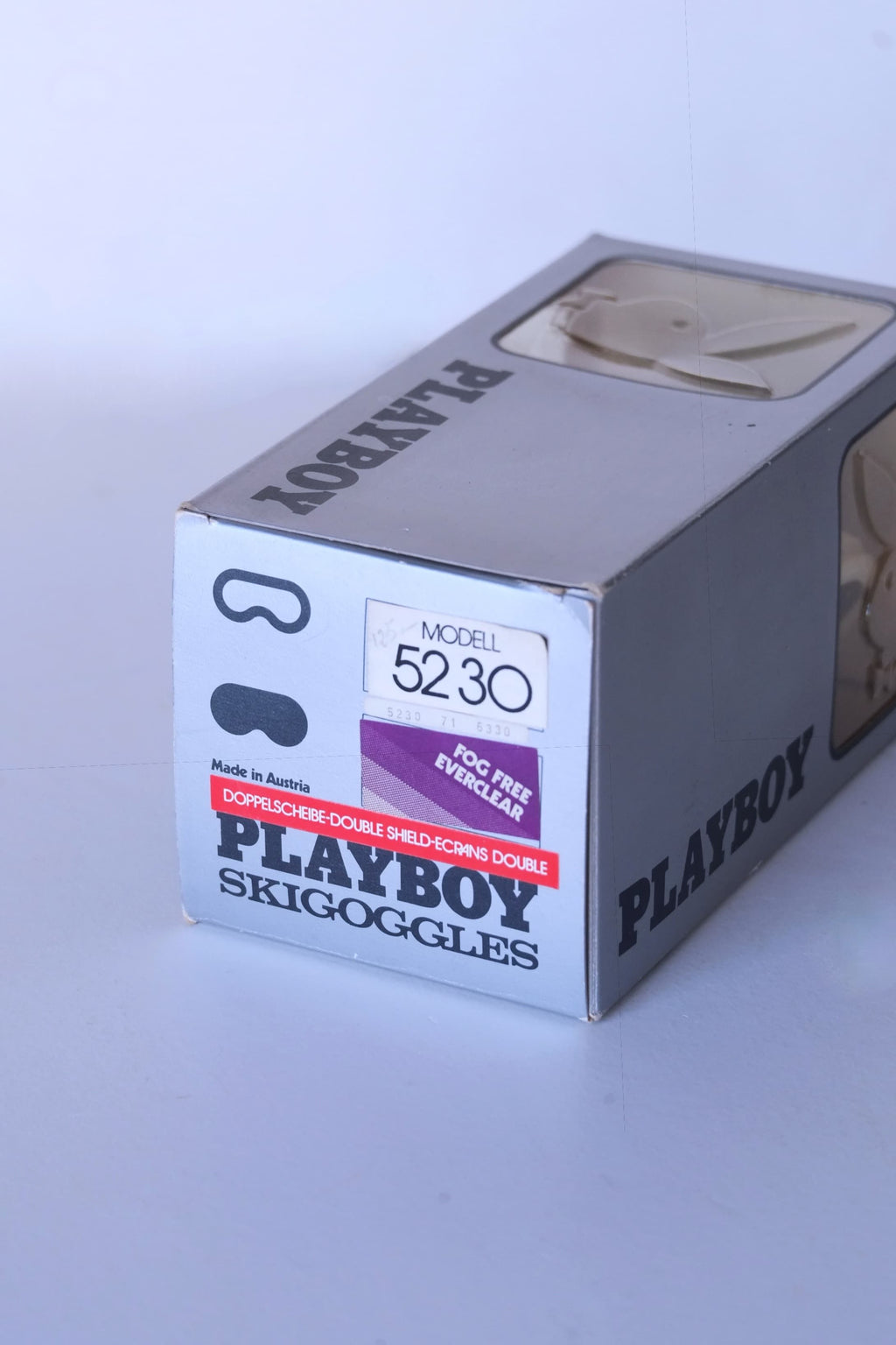 Vintage Playboy ski goggles box, model 5230, silver packaging with black logo, “Made in Austria” label, fog free Everclear sticker, and double shield lens description visible on the front.