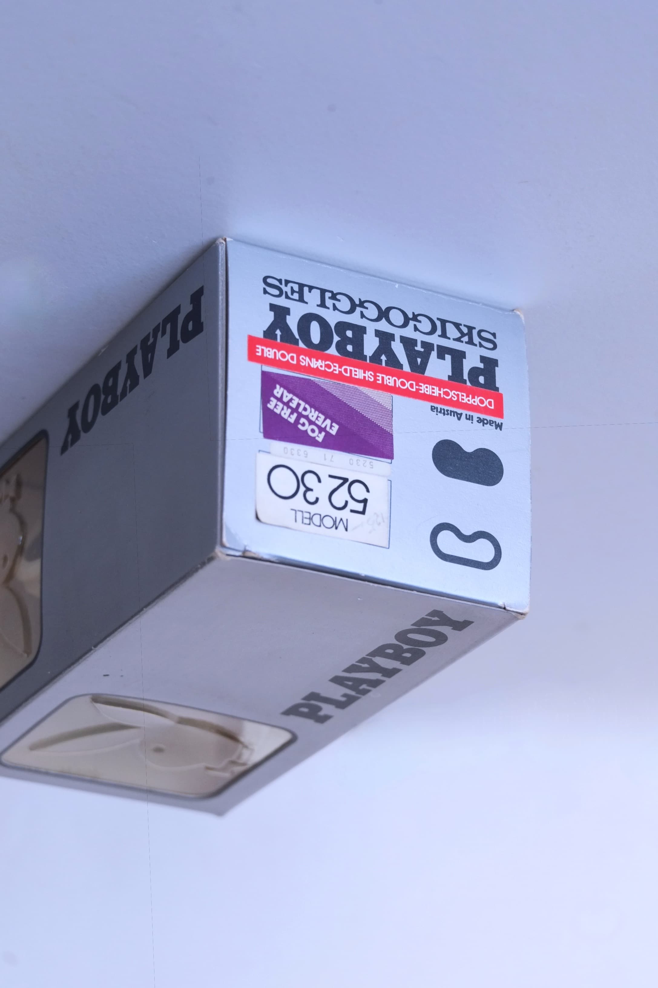 Vintage Playboy ski goggles box, model 5230, silver packaging with black logo, “Made in Austria” label, fog free Everclear sticker, and double shield lens description visible on the front.