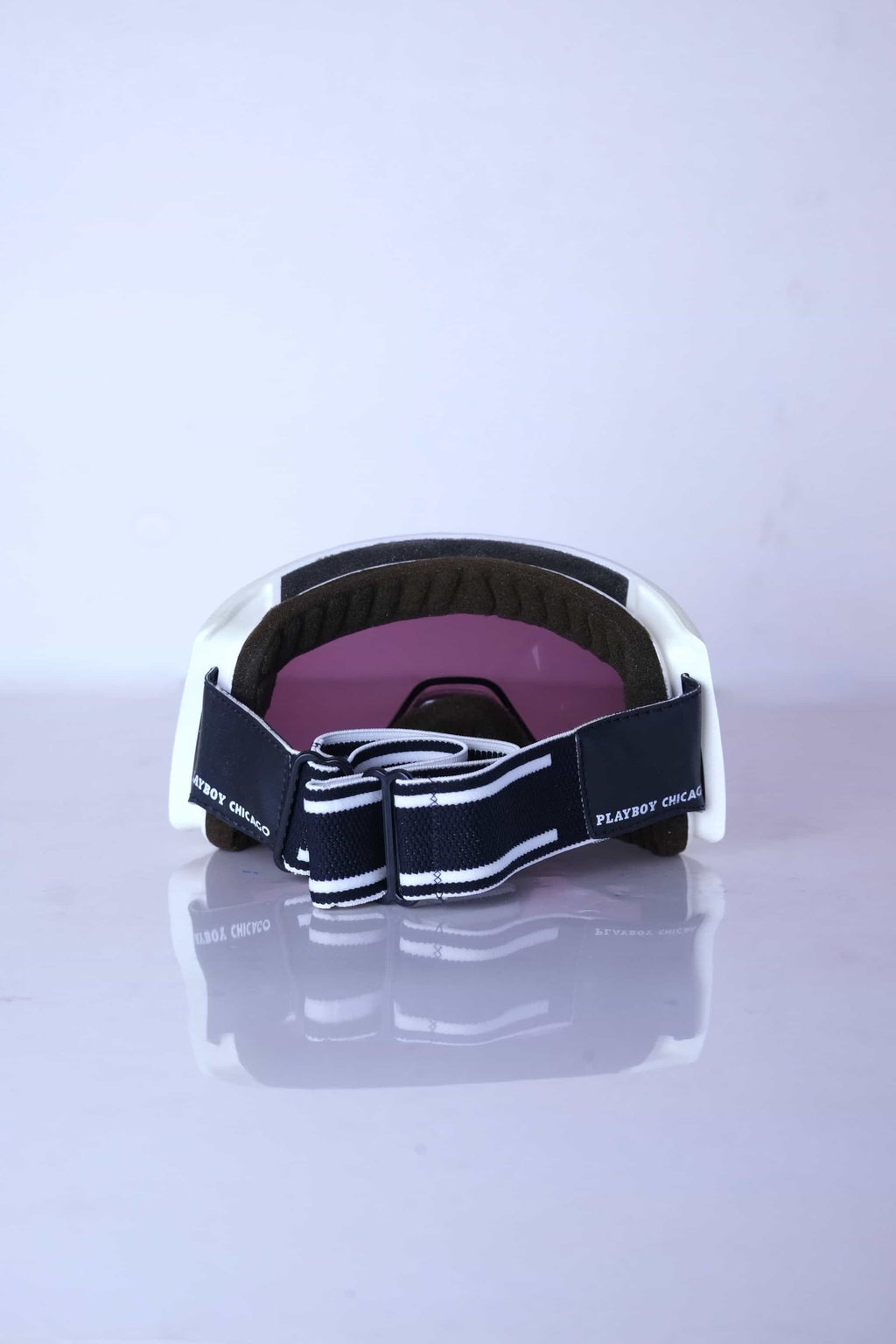 Rear view showing the "Playboy Chicago" branded strap and the excellent condition of the face padding.