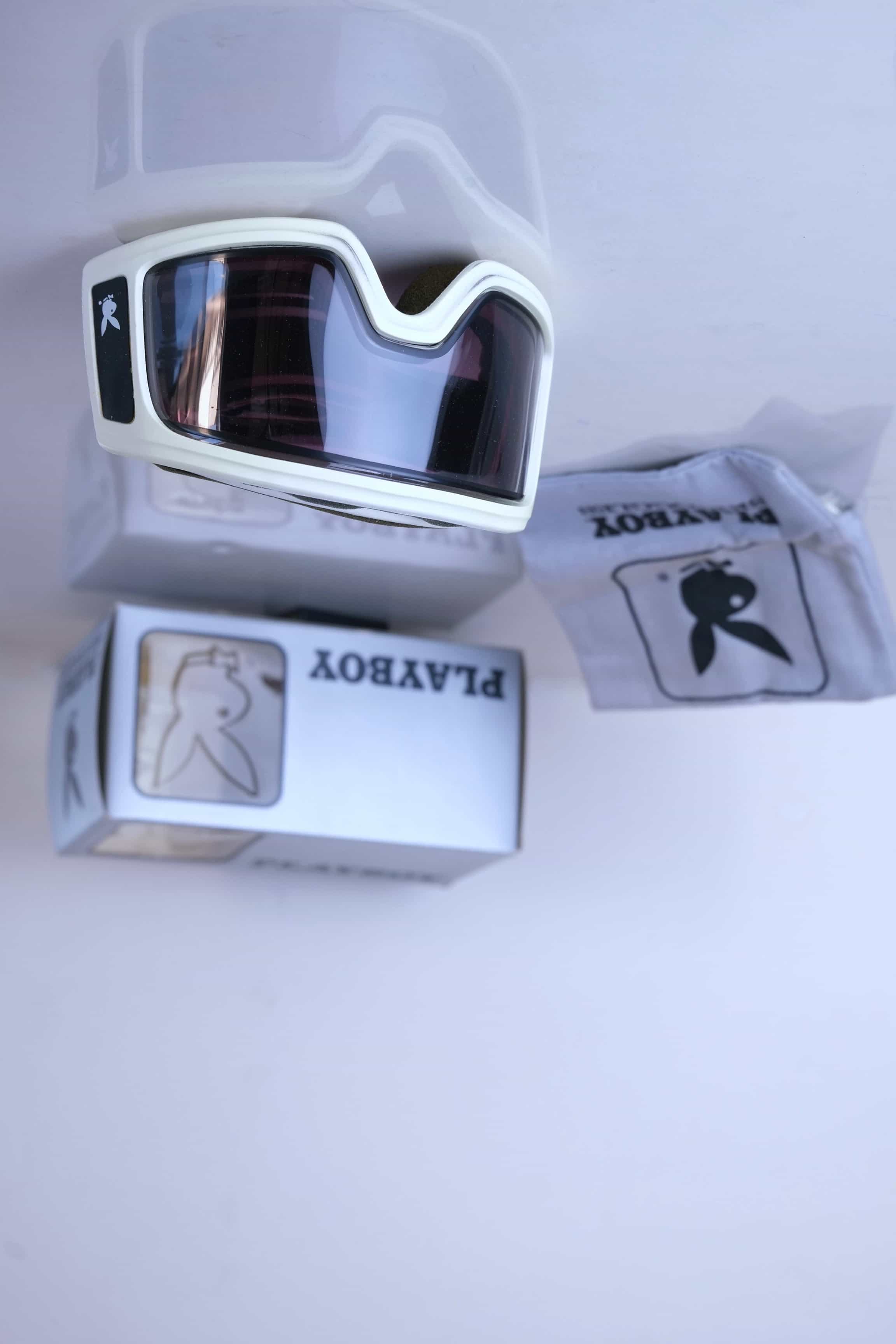 The complete vintage Playboy Chicago set, including goggles, original silver box, and grey dust bag.