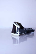 Side view of white Playboy Chicago ski goggles highlighting the rabbit head logo and intact interior foam.