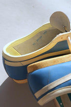 Inside heel lining of vintage Puma Top Fit sneaker displaying blue factory model code stamps 12 21103 112.
