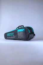 Angled view of the vintage Pacific multi-racket tennis bag, highlighting its classic two-tone paneled design.