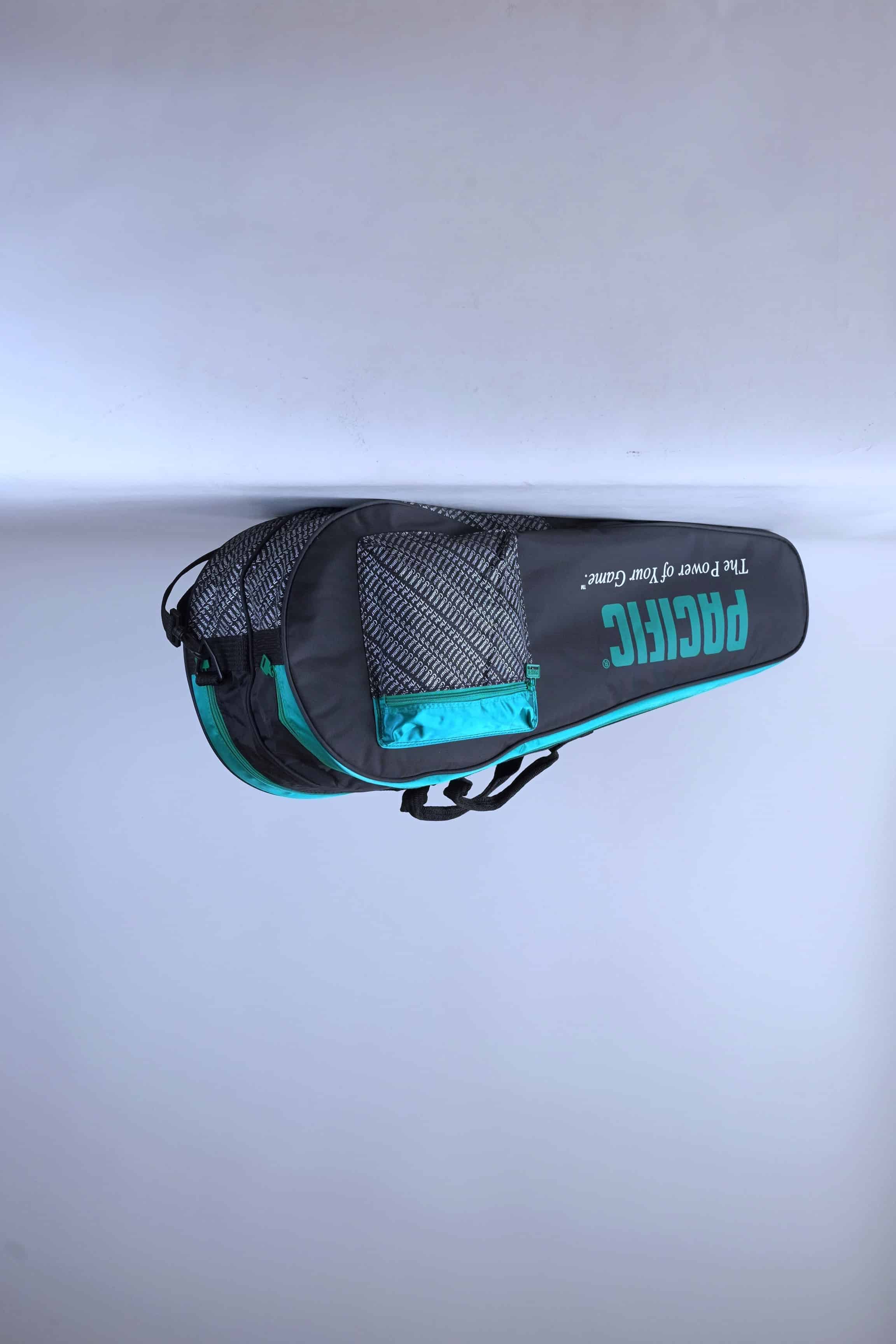 Angled view of the vintage Pacific multi-racket tennis bag, highlighting its classic two-tone paneled design.
