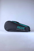 Side view of a vintage 1990 Pacific 6-racket thermal tennis bag in black, green, and white.