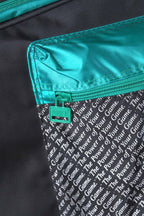 Close-up of the side accessory compartment zipper on the vintage Pacific multi-racket bag.