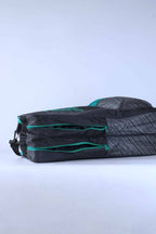 Open view of the vintage Pacific tennis bag's dual main compartments, showing the interior storage.