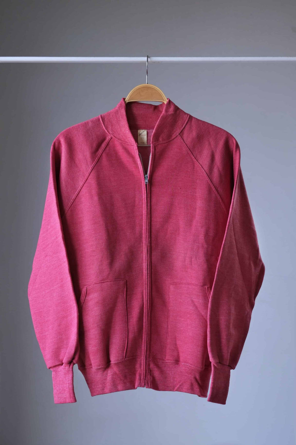 Heether red zipper sweatshirt on hanger
