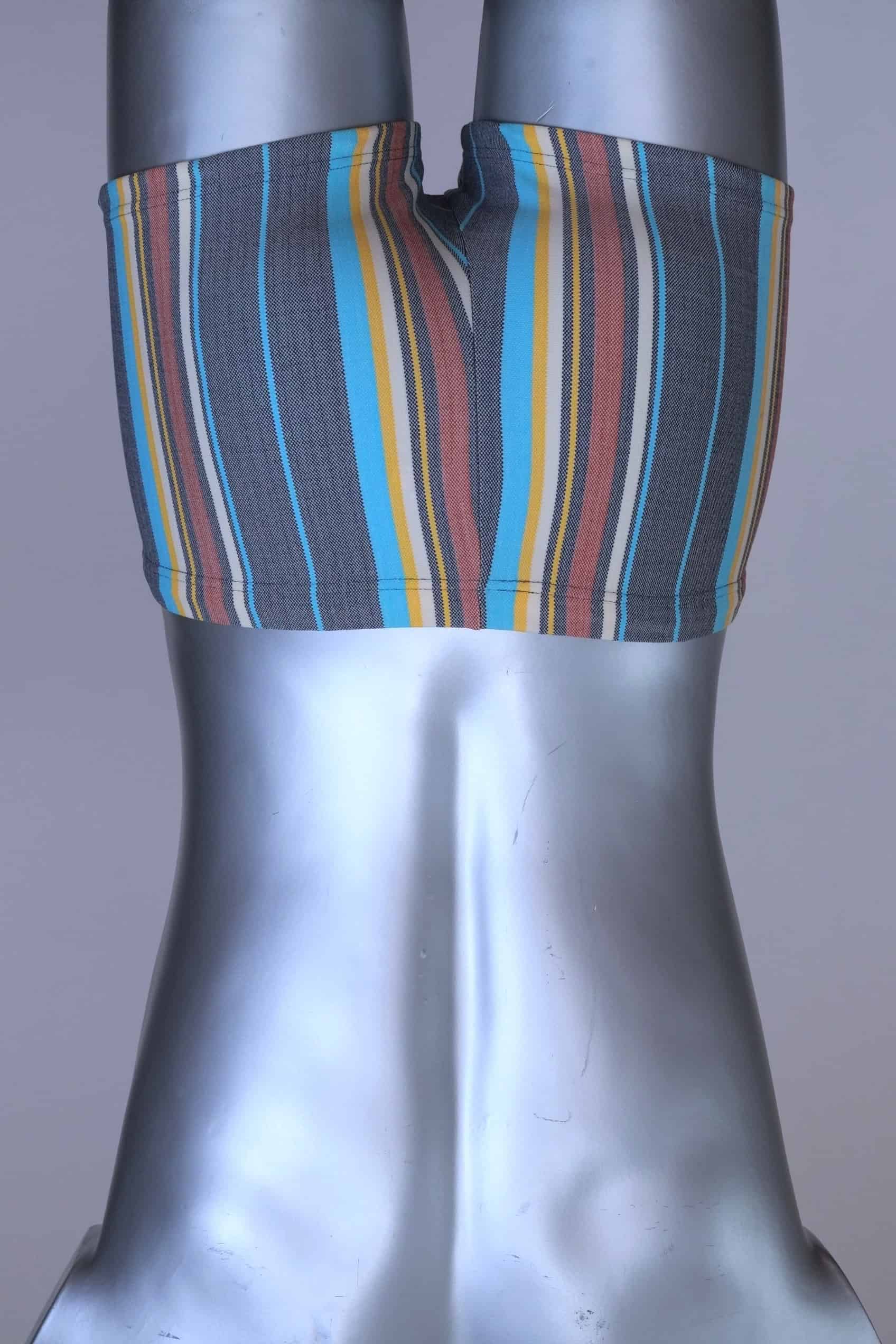 Back view of RIBANA vintage 70s swim trunks in shades of blue striped pattern, shown on a silver mannequin.