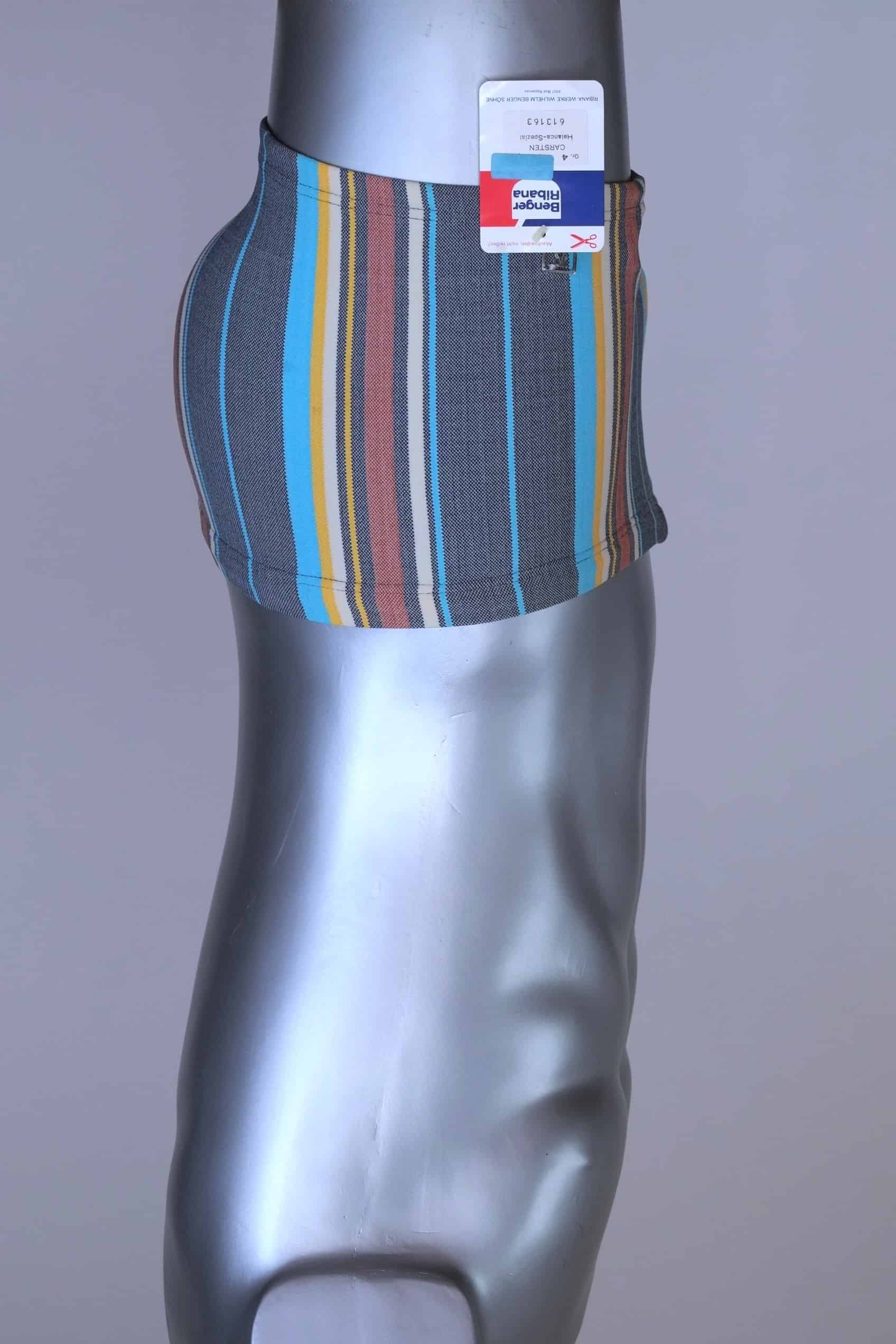 Side view of RIBANA vintage 70s swim trunks in shades of blue striped pattern, shown on a silver mannequin.