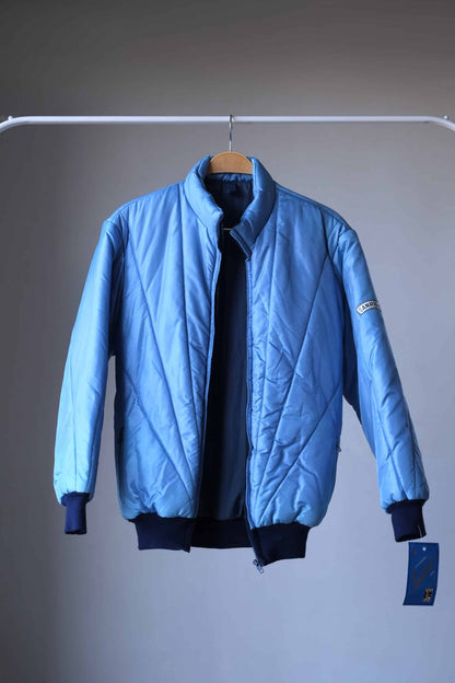 SANRIVAL Vintage 70's Ski Jacket, on hanger with zipper open. Color: metallic blue.