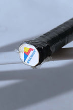 Close-up view of the white Snauwaert logo butt cap on a variation featuring a black wrapped grip.