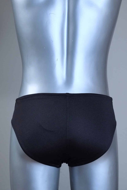 Back view of a pair of SOLAR vintage 70s swim briefs in black shown on a silver mannequin