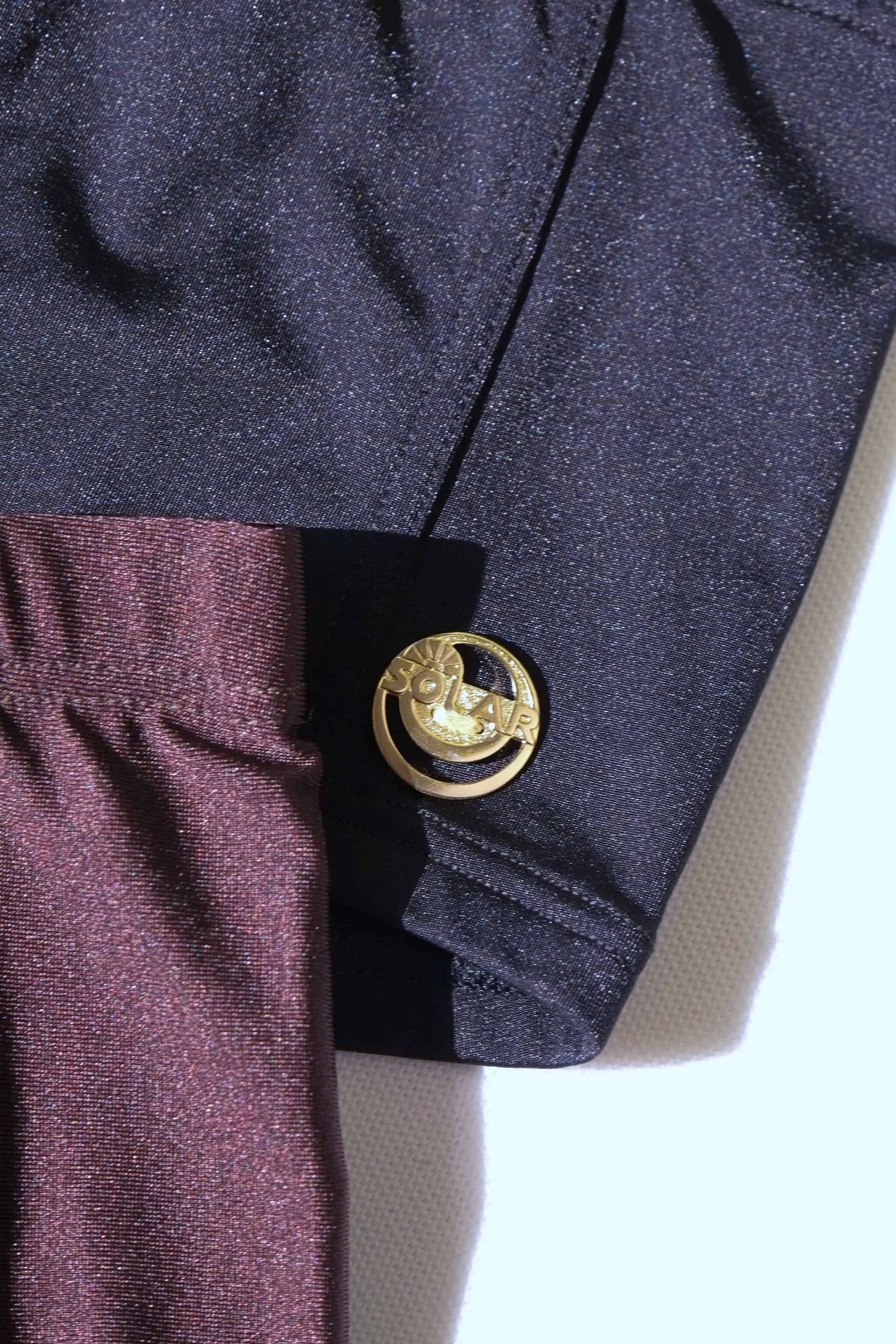 Close up of gold logo badge Solar