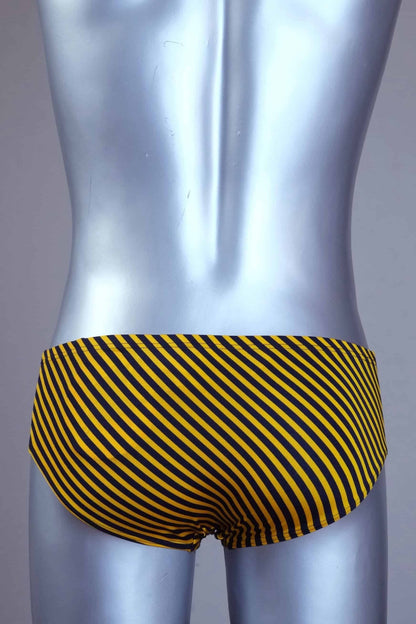 Back view of yellow striped men's Solar swim briefs on a silver mannequin against a gray background