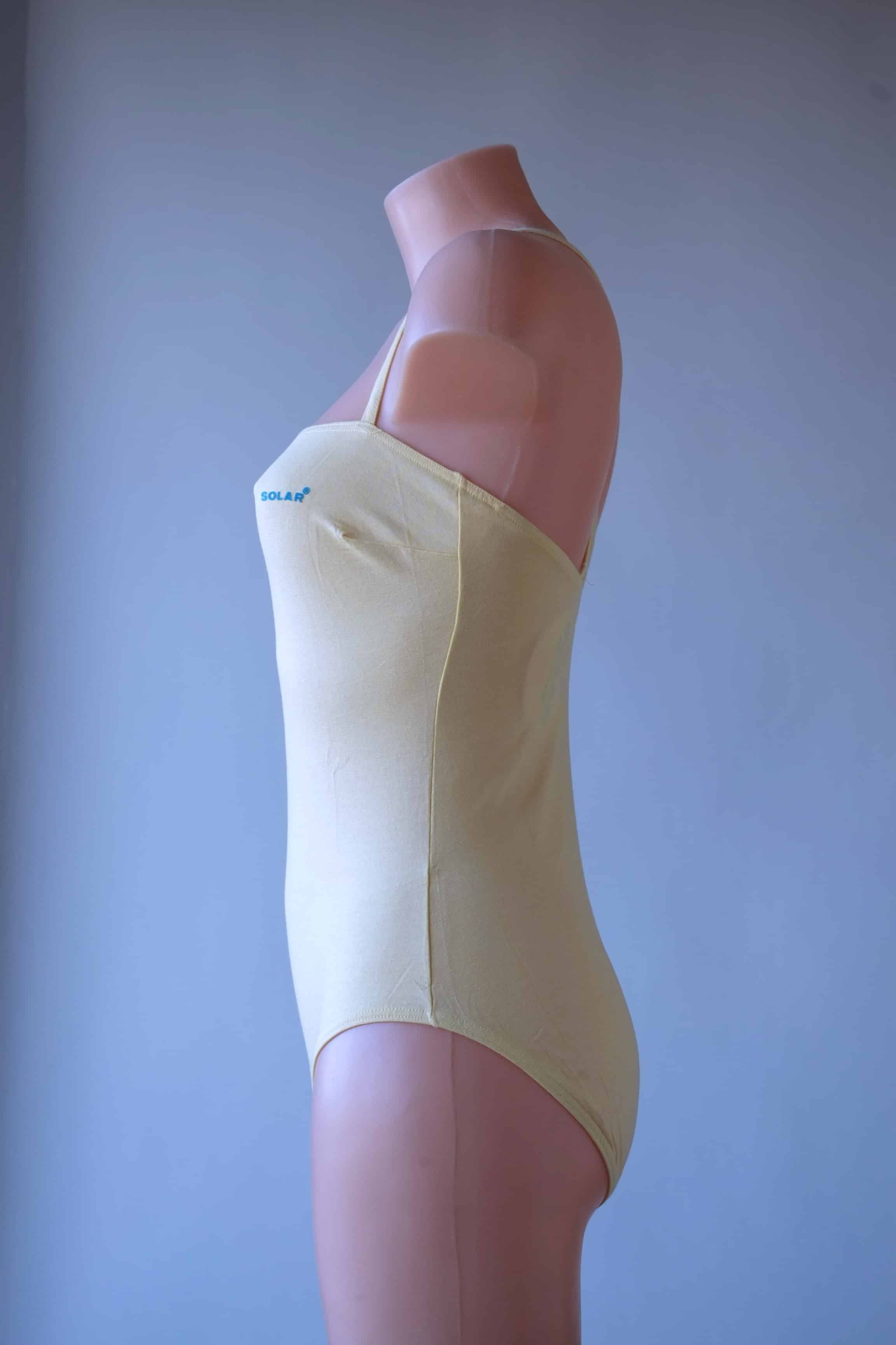 Solar vintage 80s cotton leotard in pale yellow, worn on a mannequin — square neckline with thin spaghetti straps, clean minimal side view