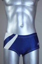 Vintage Blue and white swim briefs on a silver mannequin against a gray background