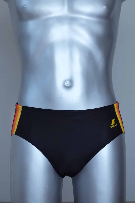 Black swim brief with colorful side band on a mannequin against a gray background