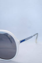 Detail view of white sporteam vintage frames on white background