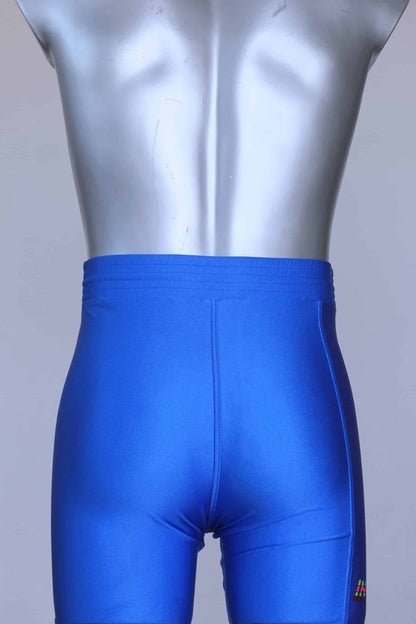 Back view of the blue vintage Sprider swim trunks hanging on a mannequin.