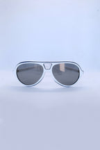 Front view of vintage 1970s SKILOOK tricolor drop aviator sunglasses featuring a crisp white acetate frame with navy blue outer trim and dark gray lenses.