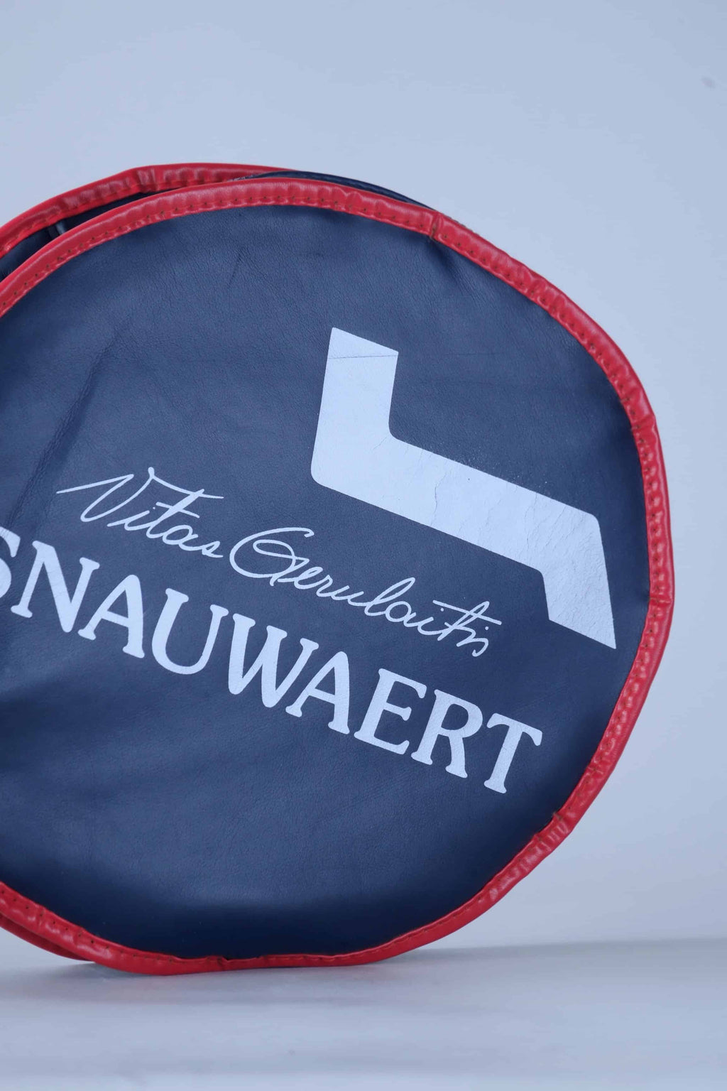 Side profile view of the archival Snauwaert tennis racquet cover, highlighting its slim zippered construction.