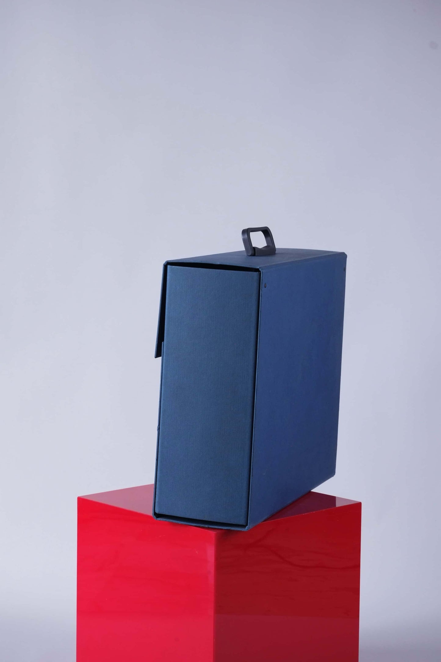 Side angle of the vintage Tecnica display case showing depth and handle position.