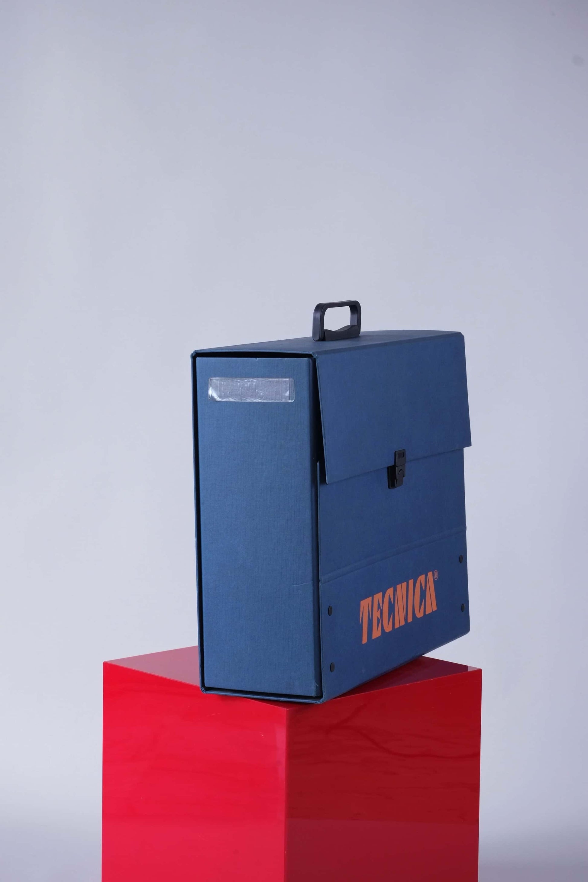 Profile side view of the Tecnica promo briefcase highlighting its slim rectangular build.