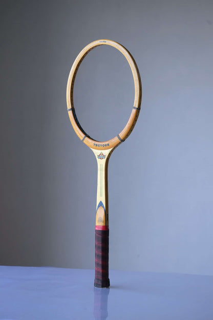 TRETORN Champion Vintage Tennis Racquet on grey background