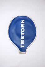 Vintage royal blue grained vinyl Tretorn tennis racket head cover with vertical white block lettering and cream-colored edge piping.