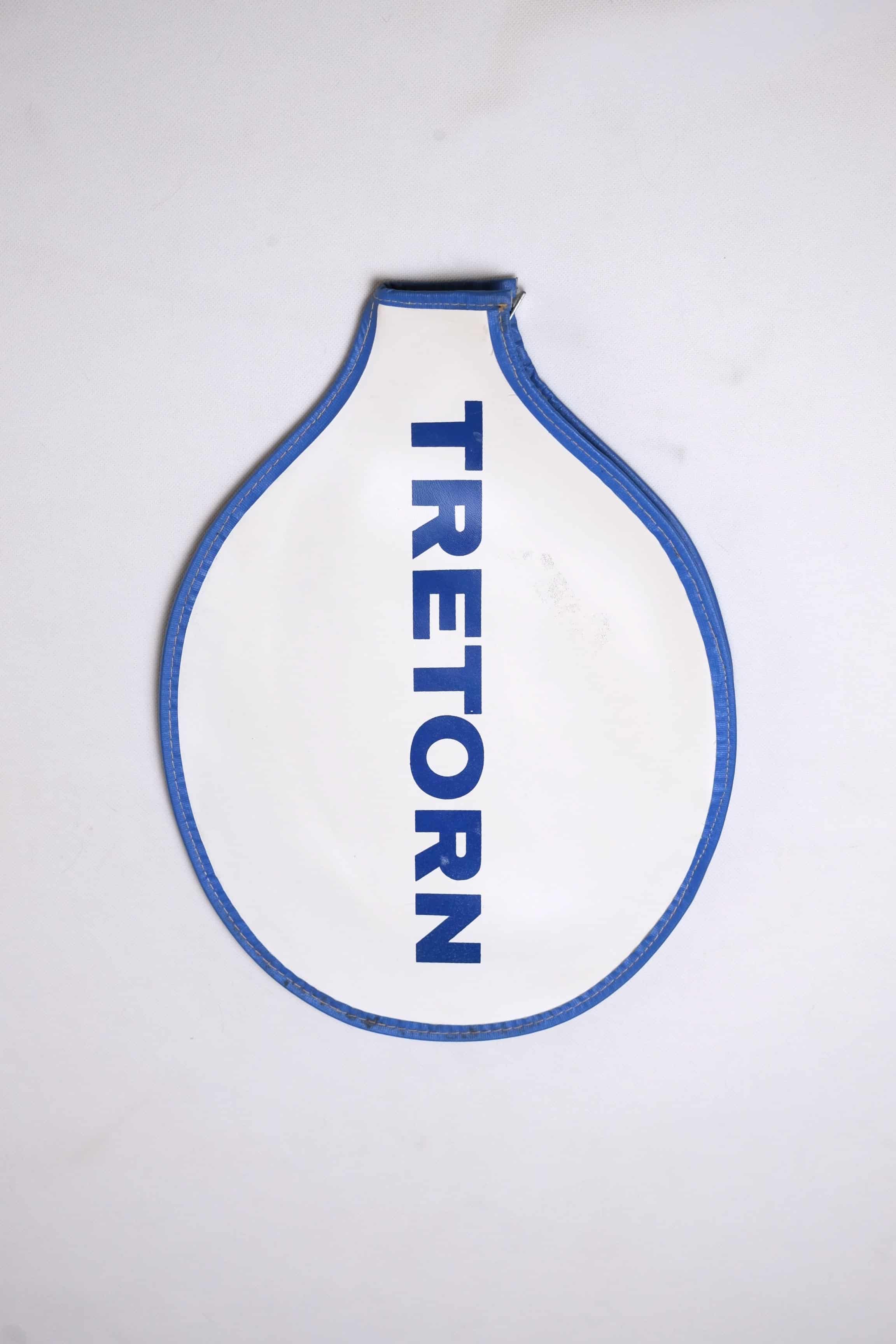 Vintage white grained vinyl Tretorn tennis racket head cover with vertical blue block lettering and blue-colored edge piping.