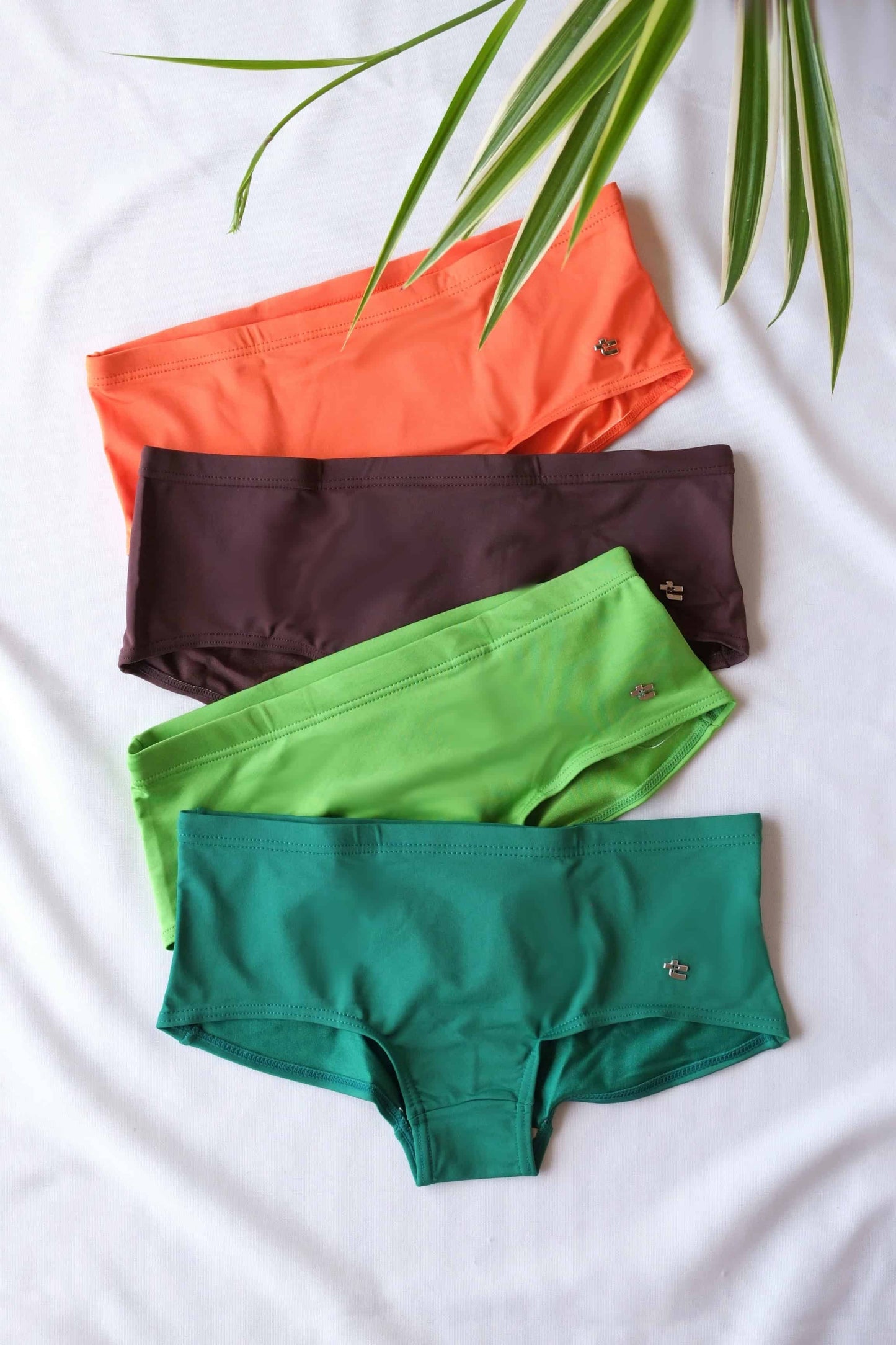 Orange brown lime green and green Tropic vintage 70s briefs on white background